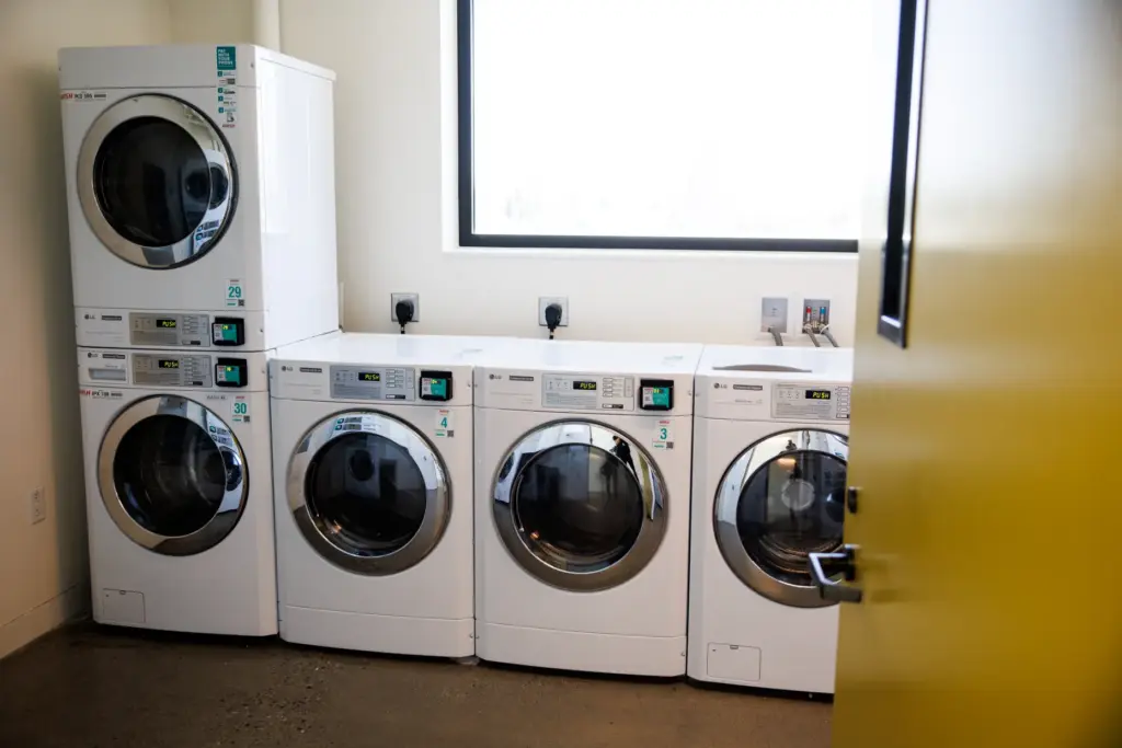 A laundry room at The Charles, a 99-unit apartment complex...