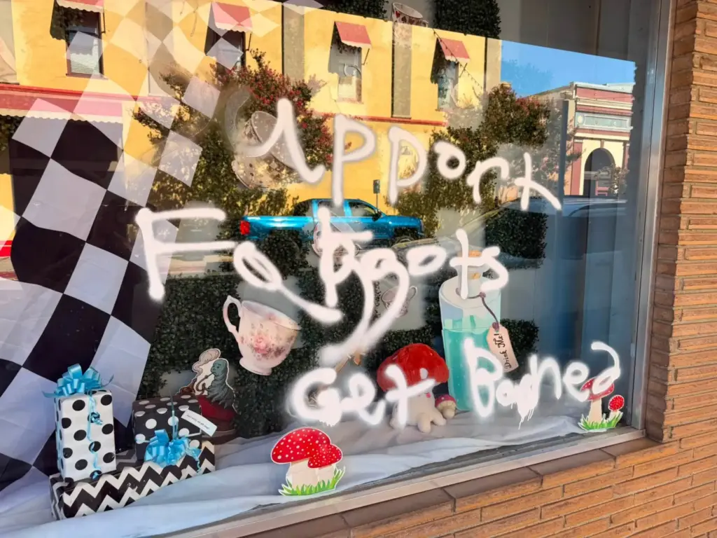 An unknown perpetrator graffitied anti-LGBTQ+ slurs onto the windows of...