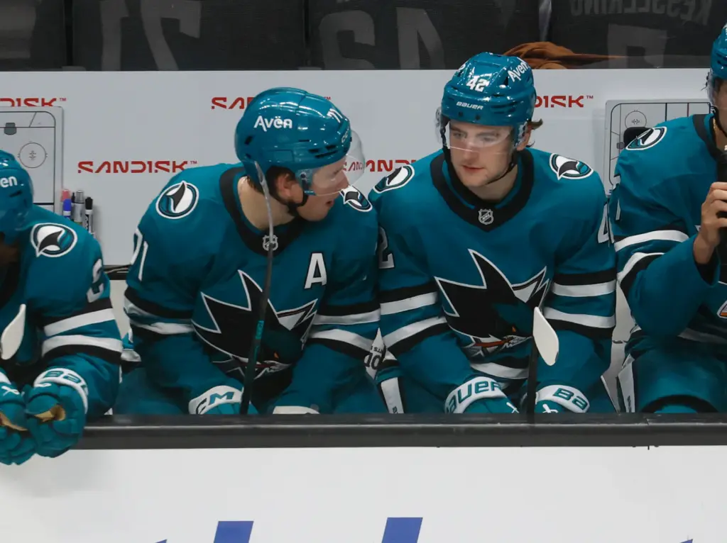 San Jose Sharks' Macklin Celebrini (71) chats with San Jose...