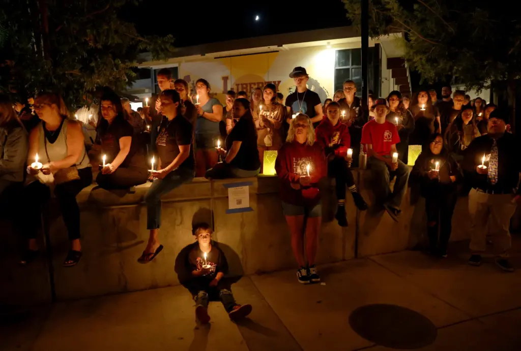 Hundreds attend a vigil for seniors Dominic Ferrari, and Caden...