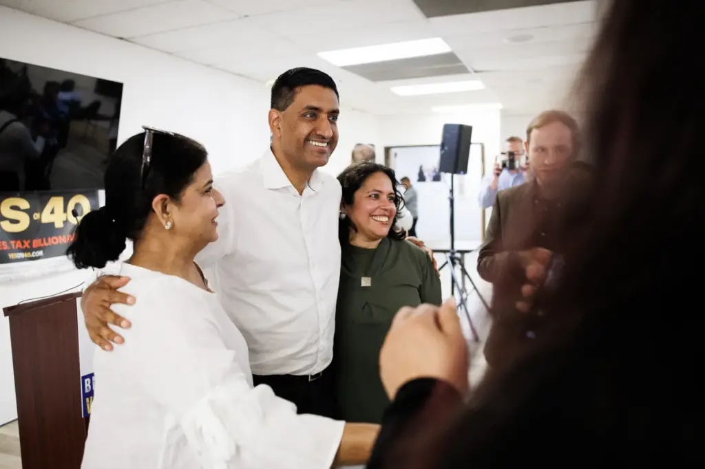 U.S. Rep. Ro Khanna (D-Calif.), center, mingles with attendees during...