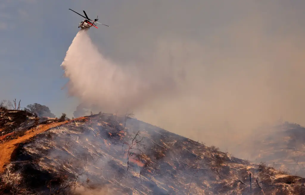 Cal Fireâs Boggs Mountain Helitack makes a drop on the...