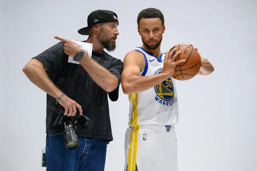 Golden State Warriorsâ Stephen Curry (30) gets instructions from team...