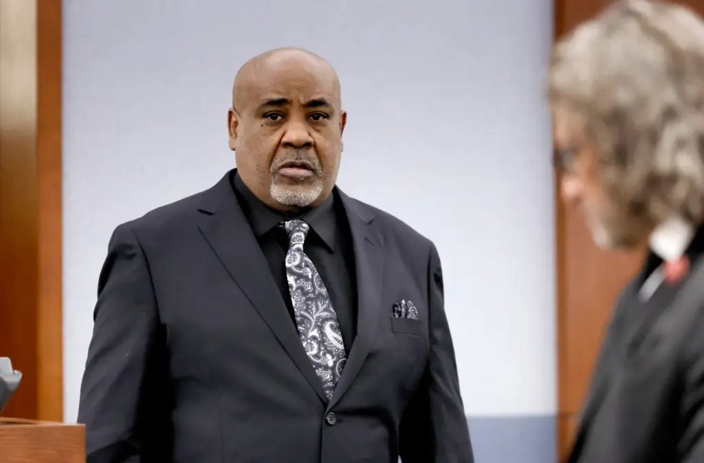 Duane Davis enters the courtroom before closing arguments in his...