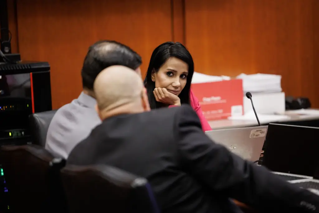 Deputy Alternate Defender Mishya Singh, right, listens during a hearing...
