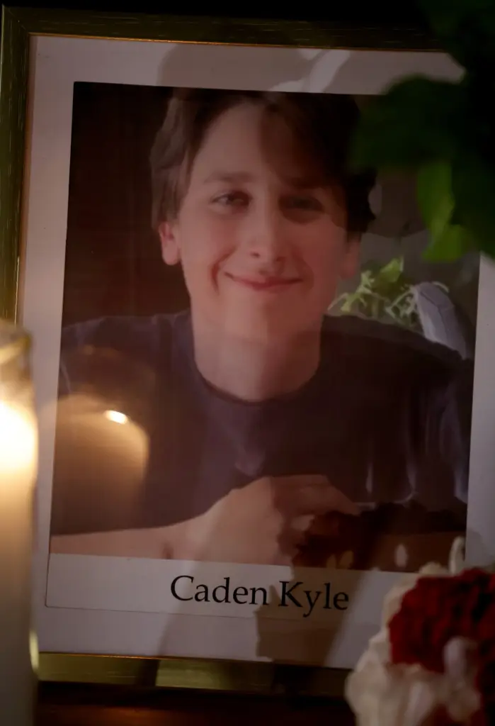 A photo of senior Caden Kyle, 17, during a vigil...