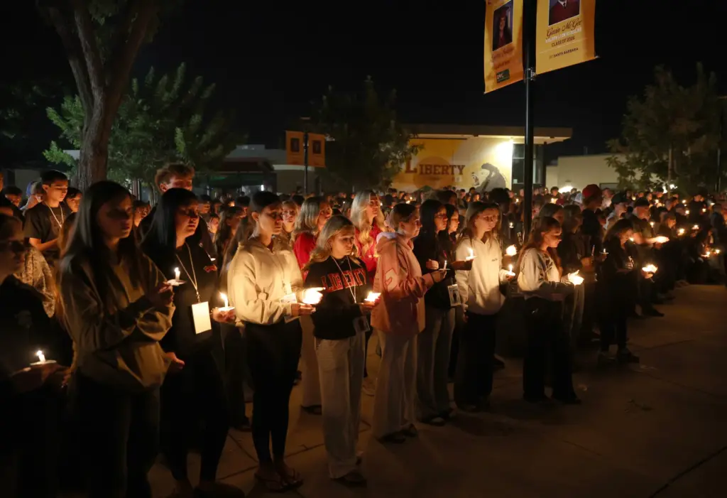 Hundreds attend a vigil for seniors Dominic Ferrari, and Caden...