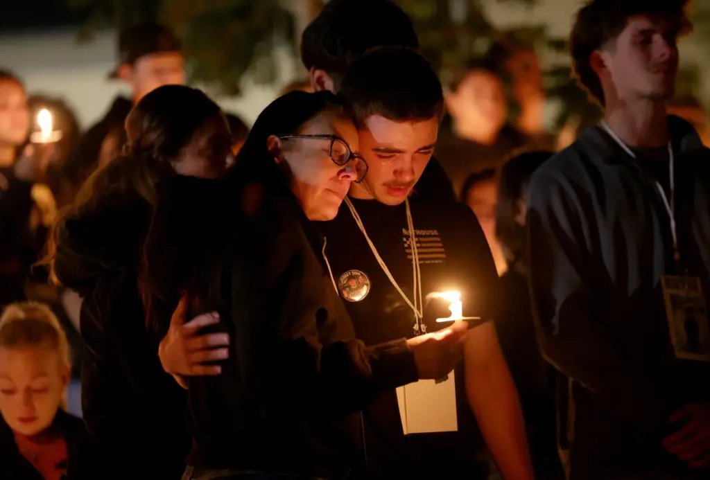 Melissa Roper and her stepsonâs friend Logan White comfort each...