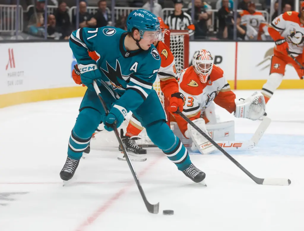 San Jose Sharks' Macklin Celebrini (71) looks to pass against...