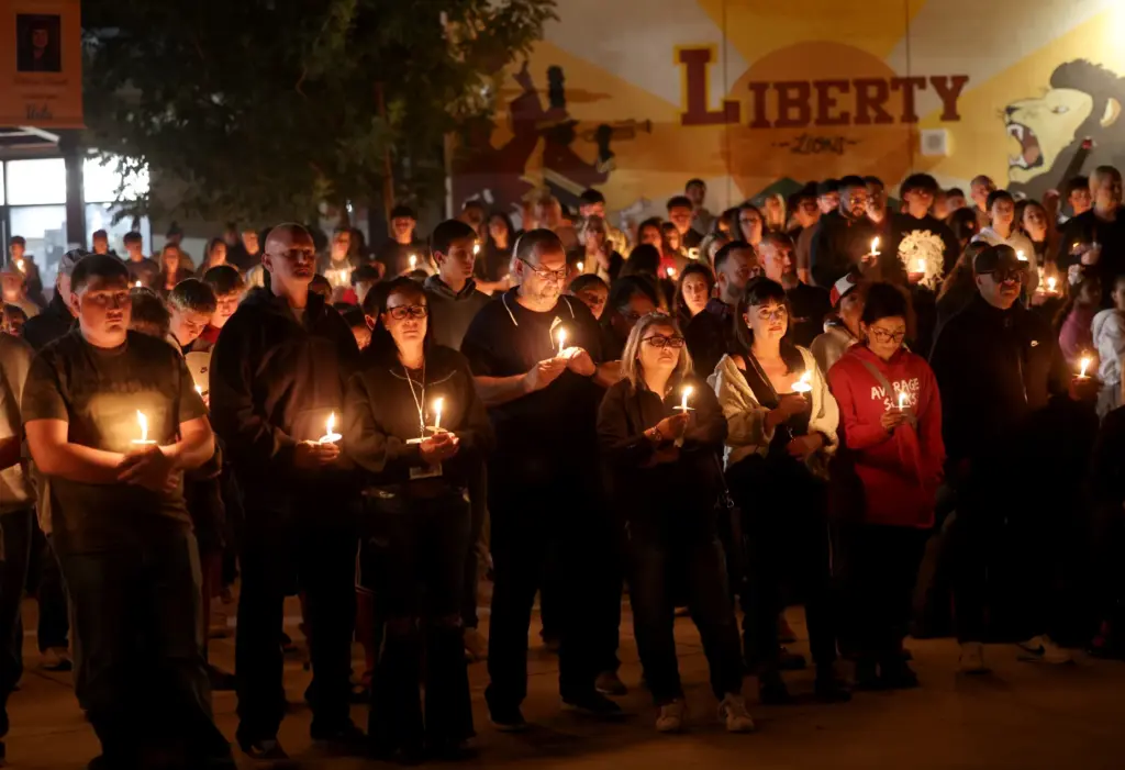 Hundreds attend a vigil for seniors Dominic Ferrari, and Caden...