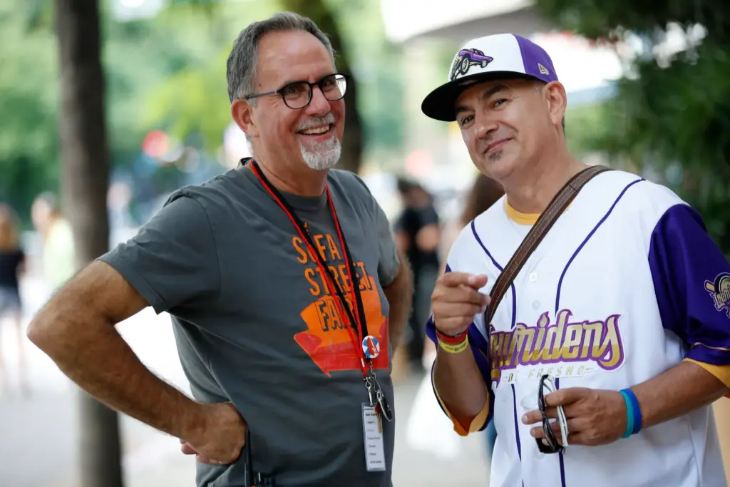 Fil Maresca, left, is photographed with attendee at the tenth...