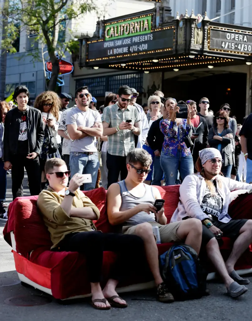 The crowd watches The Dangaleros band at the SoFA Street...