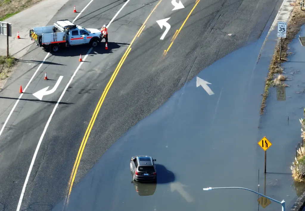 A drone view of a stranded car in high tide...
