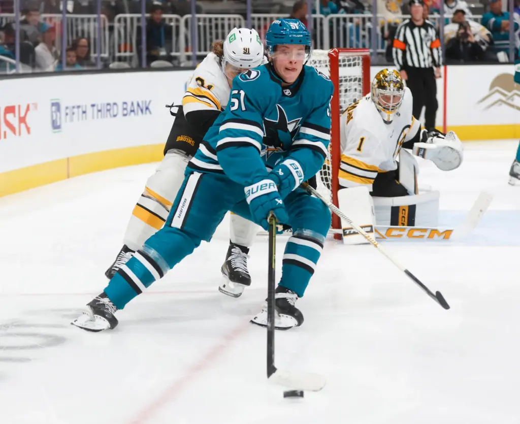 San Jose Sharks' Collin Graf (51) controls the puck against...
