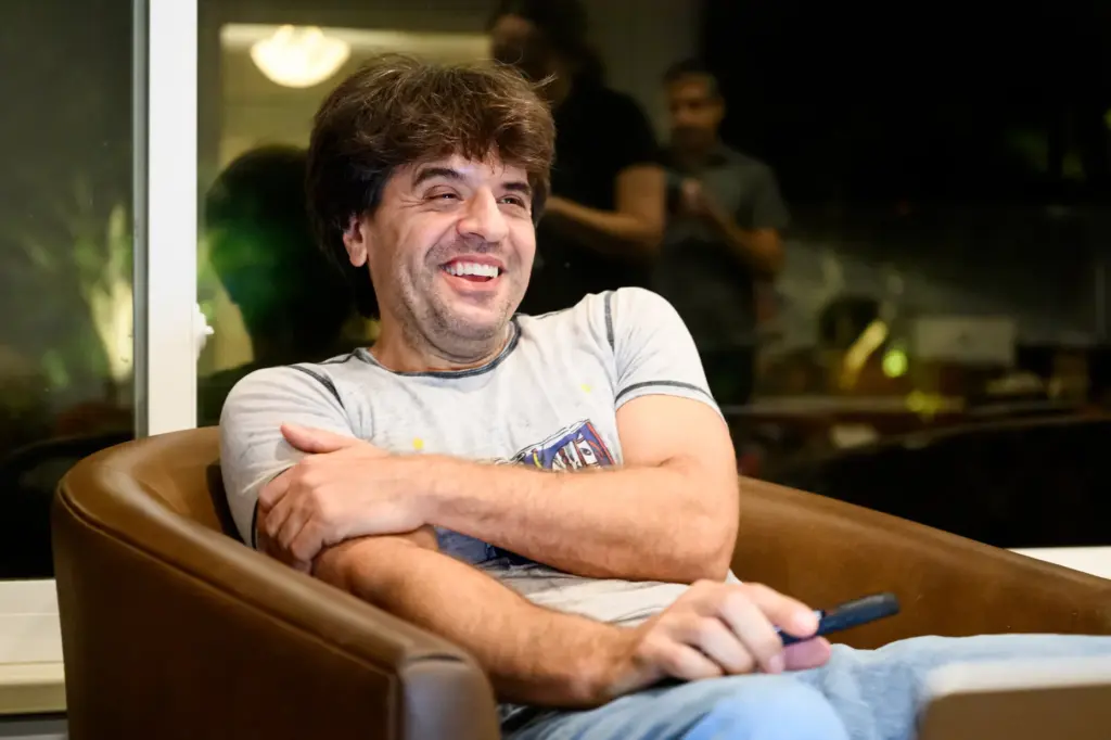 Karl Deisseroth smiles at home.