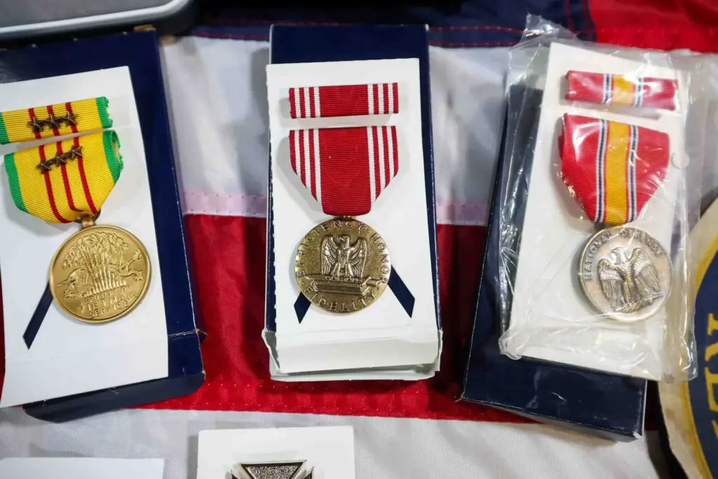 A Vietnam Service Medal, left, a U.S. Army Good Conduct...