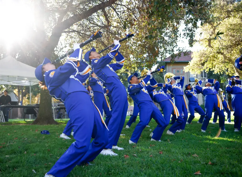 SJSU marching band performs before a panel speaks to Dr....