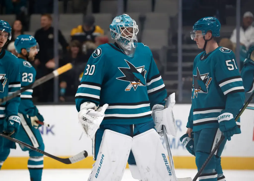 San Jose Sharks goaltender Yaroslav Askarov (30) skates off the...