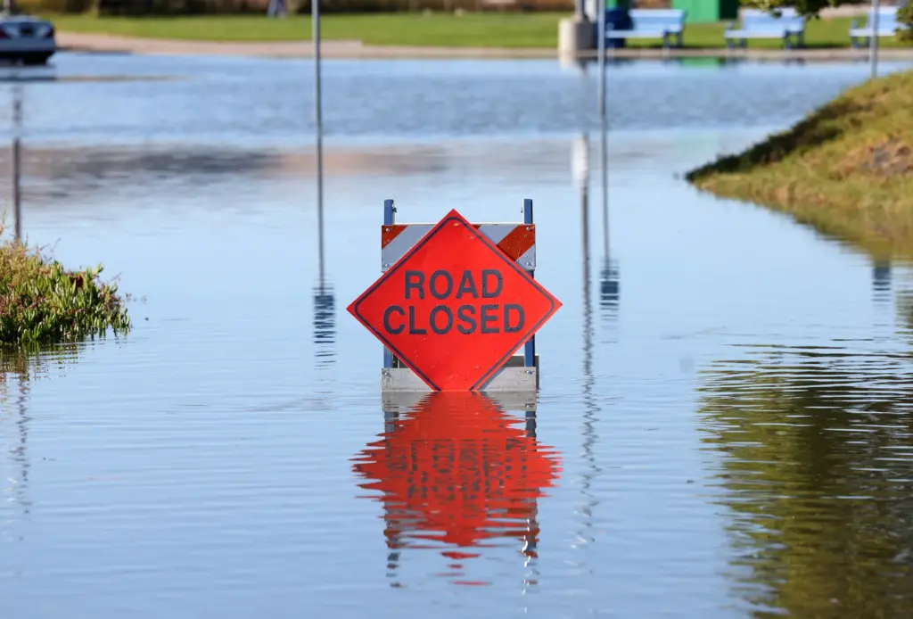 A road closed due to high tide flooding at the...