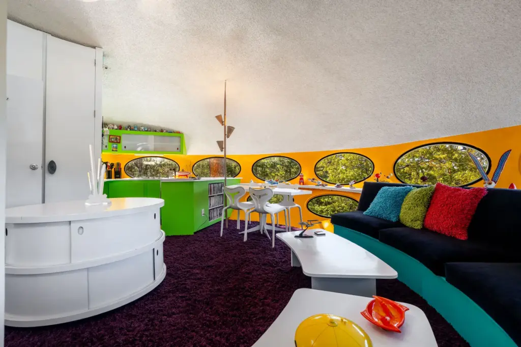 The lounge and dining area with built-in seating. (Photo by...