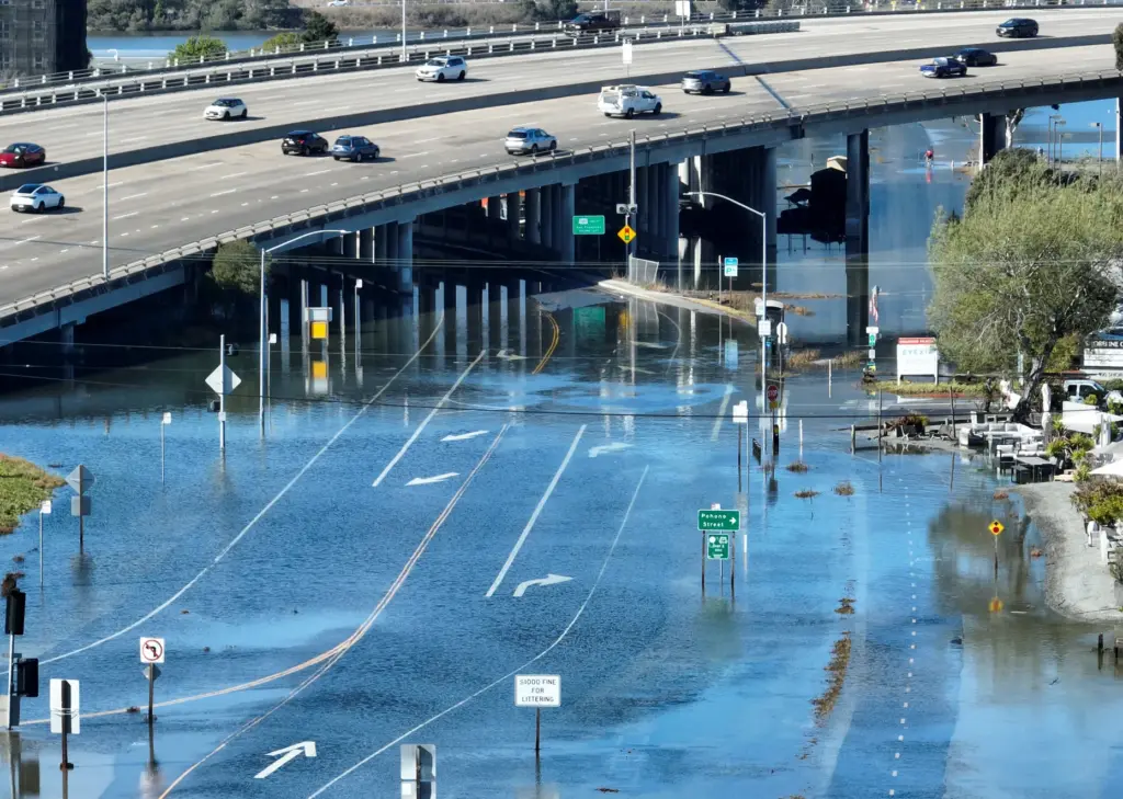 A drone view of high tide flooding near the Mill...